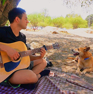 2025-04-27 Doggy Day Out - Still Capture Playing Guitar (1).jpg