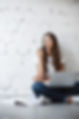 portrait-young-dreamer-student-lady-chewing-pen-getting-ready-her-final-exams-using-laptop