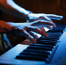 Hands Playing Keyboard