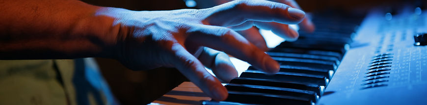 Hands Playing Keyboard