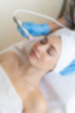 young-woman-lying-cosmetologist-s-table-rejuvenation-procedure-cosmetologist-take-care-abo