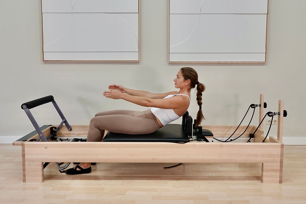 Reformer Pilates Übung Roll Down
