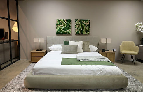 Green and white bedroom with moss wall art by Ninfa studio.JPG