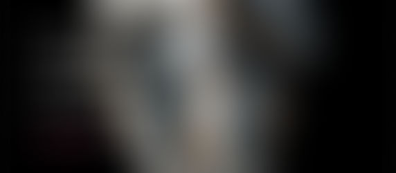 Half marble classical sculpture merging with neural network structure, symbolizing AI art authorship and human-machine creativity.