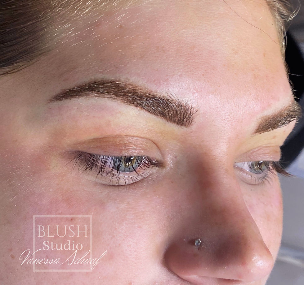 close up of a woman with microblading, a permanent brow tattoo