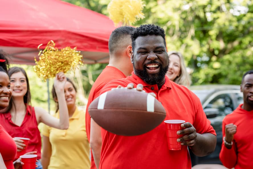 friends tailgating at a football game