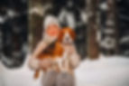 woman outside having fun with her dog