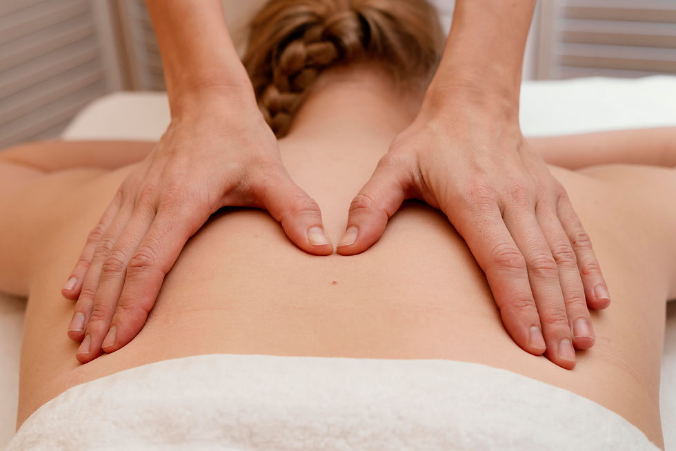 close up therapist massaging back