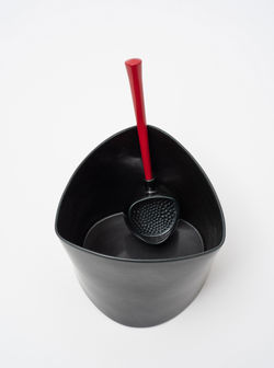 (a) and (b) Black triangulated bowl and black sieve with red lacquer handle, 2021