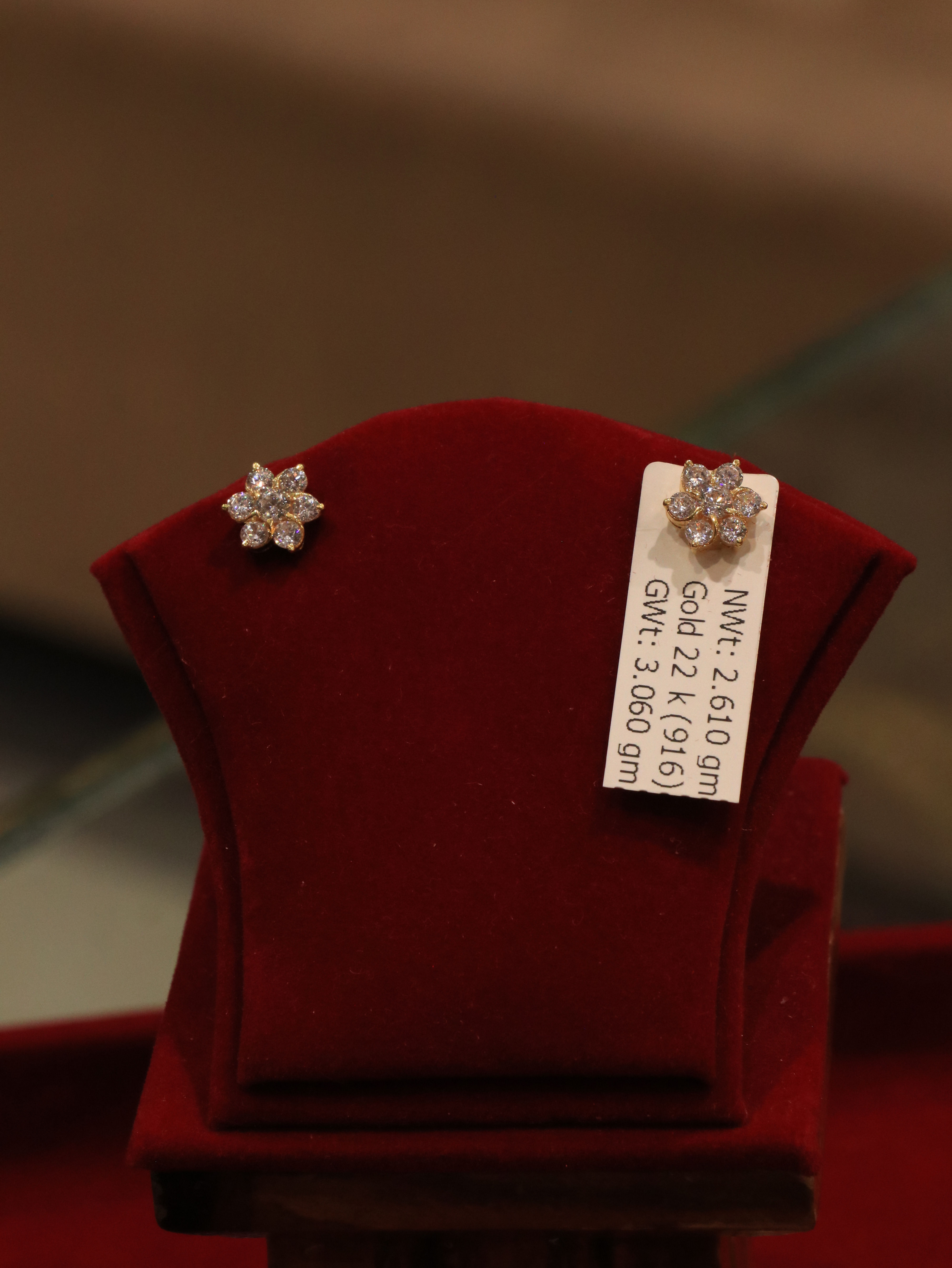 22k gold flower design earrings for daily use in Nepal