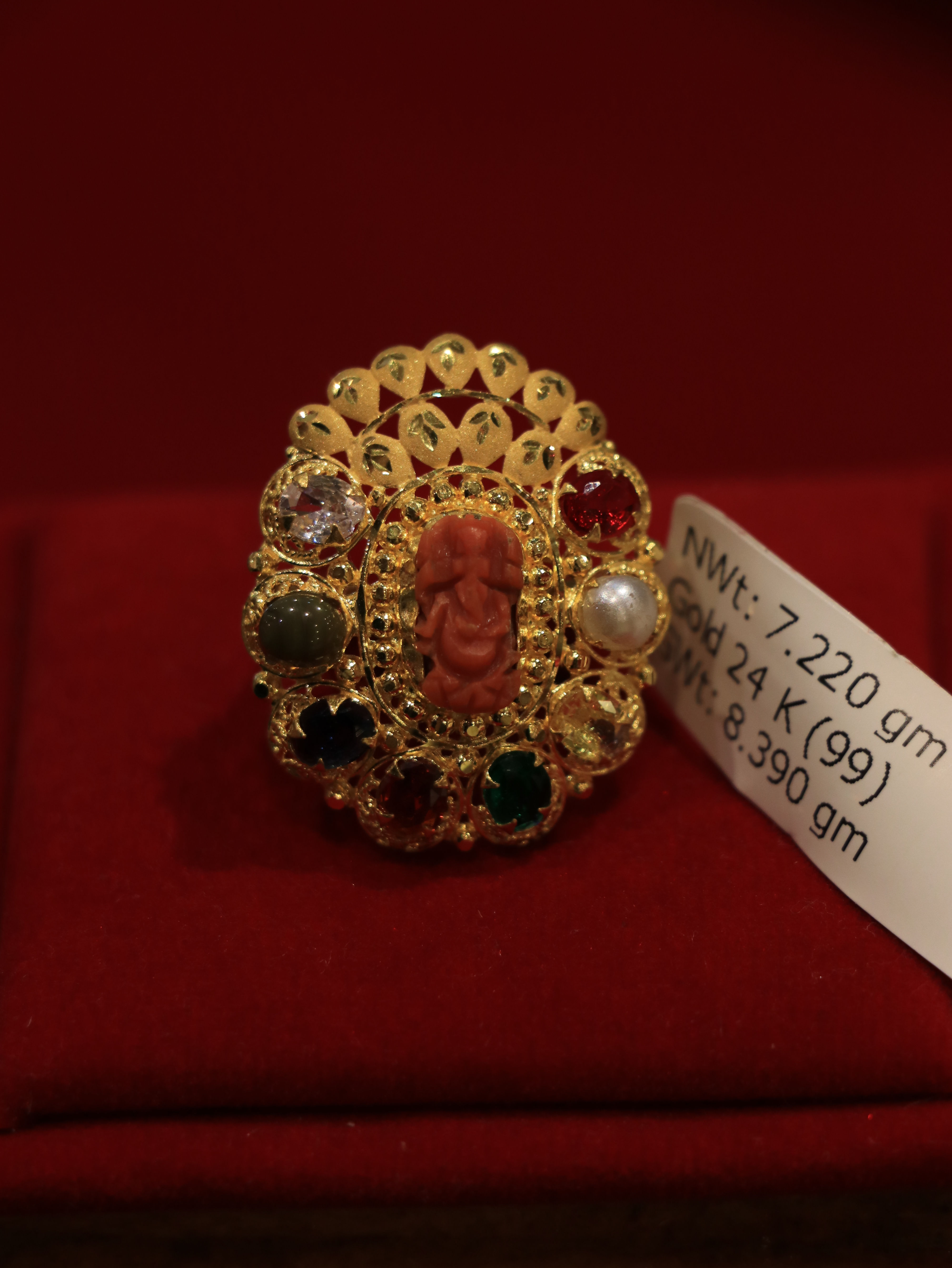 Premium navratna ganesh munga gold ring with intricate gemstone setting and divine motif