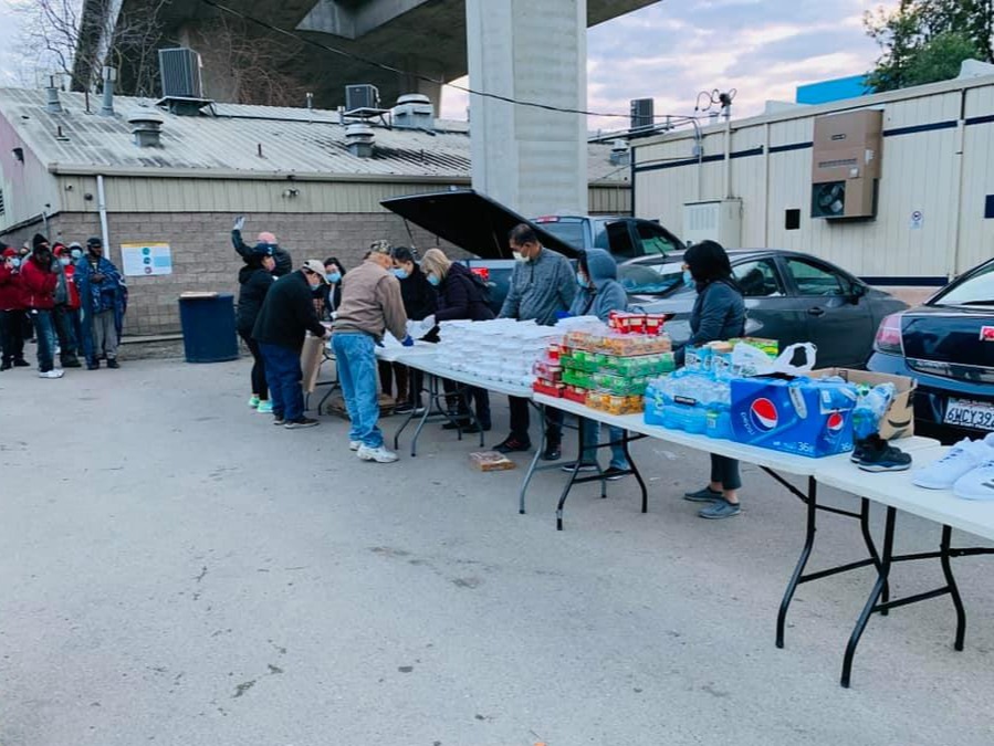 Community members coming together for an outreach event