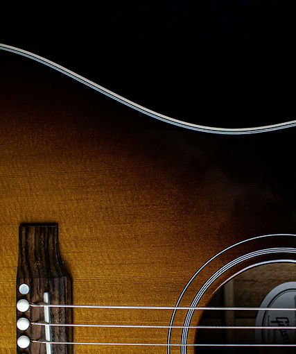 Acoustic guitar detail representing guitar classes at KW School of Music and Art in Waterloo