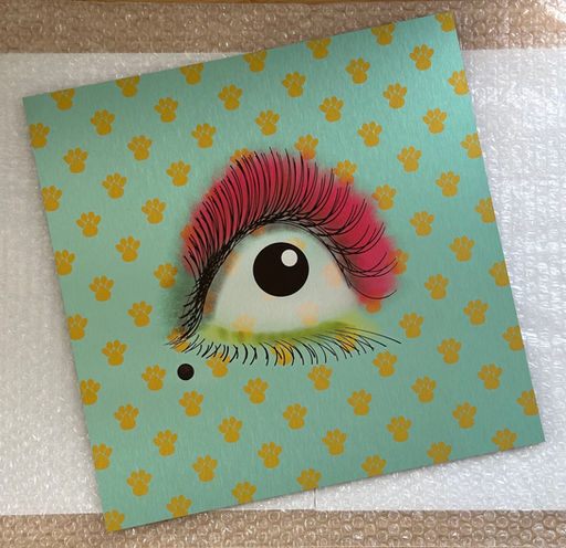 Stylised Eye image printed onto a brushed aluminium surface