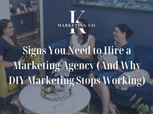 Three women converse in a modern office with blue walls, sitting on a couch and chair. Text reads: "Signs You Need to Hire a Marketing Agency."