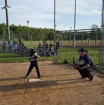 kid at home base