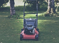 Lawnmower in a nice garden