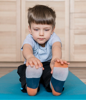 portrait-adorable-young-boy-stretching_edited.jpg
