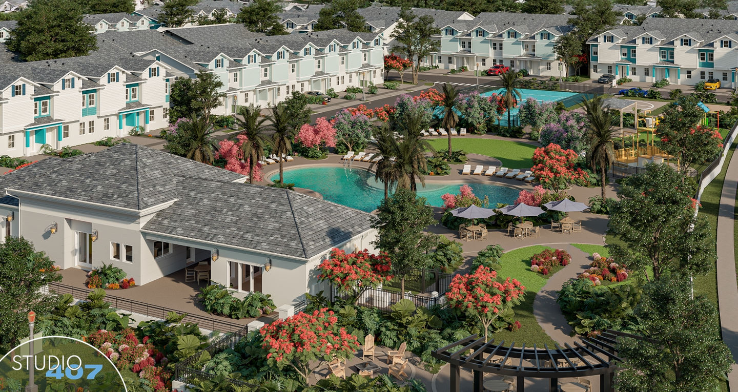Aerial view of a landscaped resort with pools and colorful trees among duplex houses.