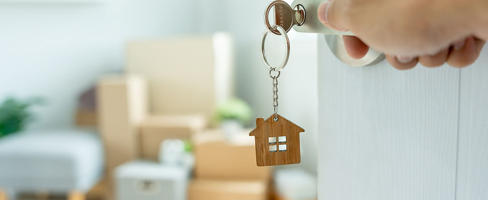 Moving house, relocation. The key was inserted into the door of the new house, inside the