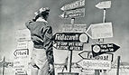 British_soldier_examining_German_Italian_signs_near_Mersa_Matruh_November_1942 (1).jpg