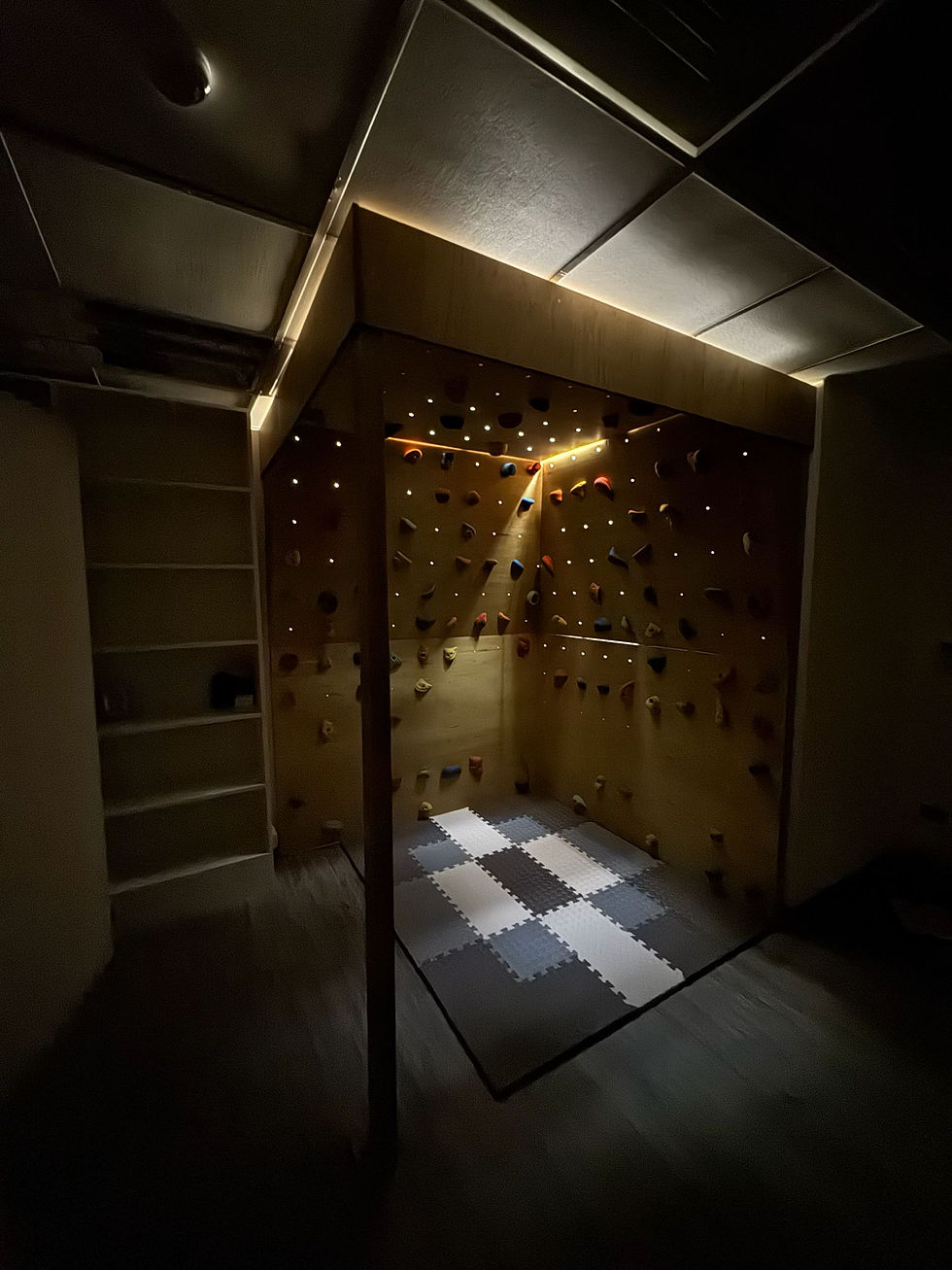 KSL lab finishing the installation of a climbing wall