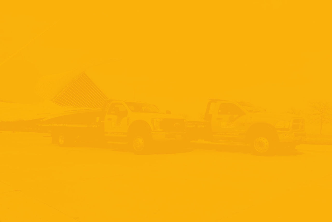mke towing & recovery- Towing yellow - milwaukee