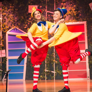 Tweedle Dee and Tweedle Dum. Children holding hands