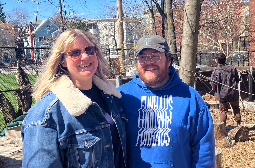 Lizi Bennett and Matt Challes are Growing Center volunteers who got engaged in the garden during the Wreath Sale.