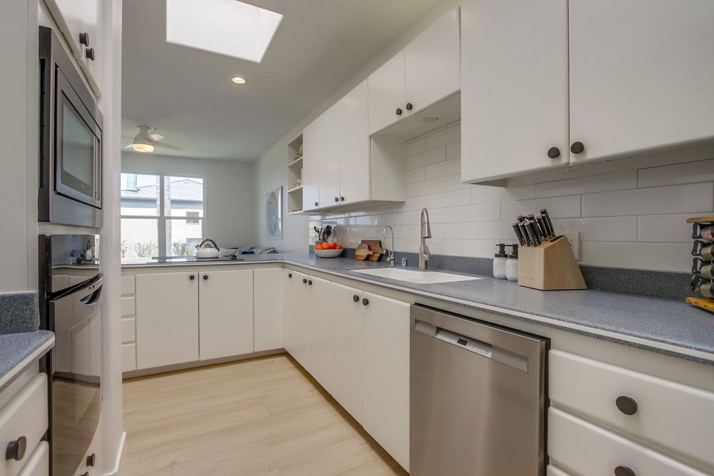 A fully equipped kitchen for a family of seven people at Ocean Oasis vacation rental in San Diego