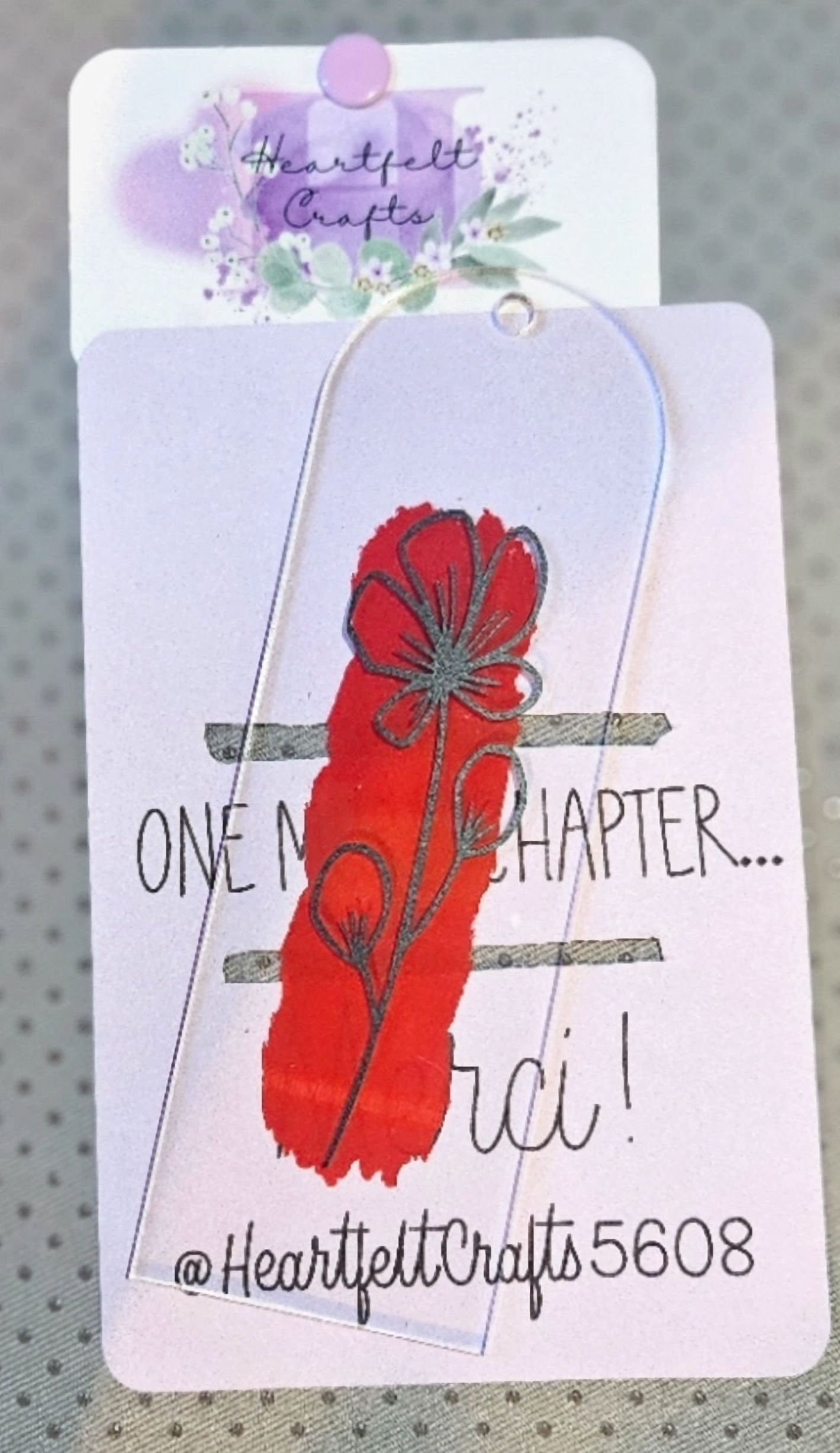 Floral bookmark with red flower and 'One More Chapter' text