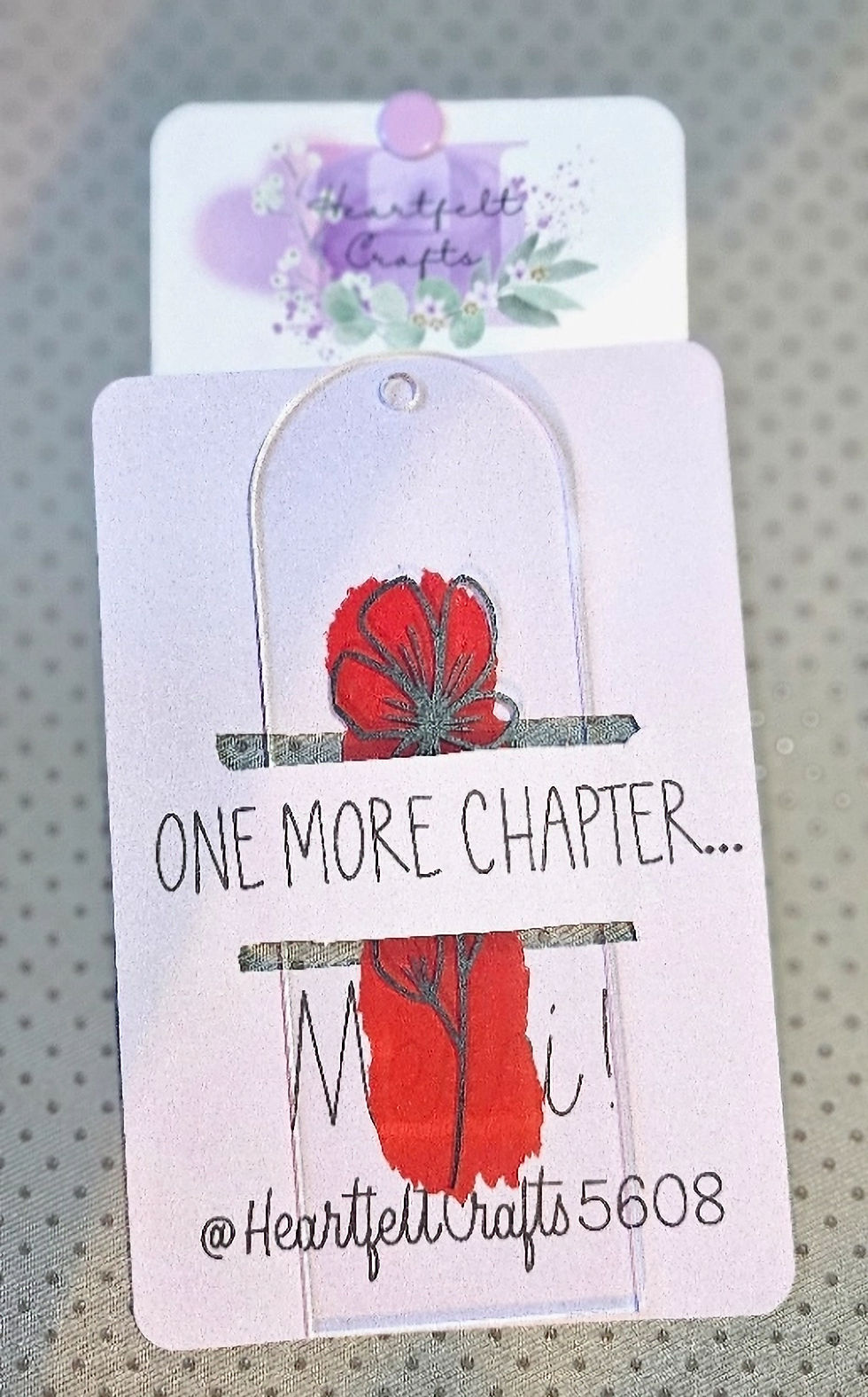 One More Chapter floral bookmark with red flower design