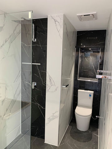 Quality bathroom renovation with black and white tiles