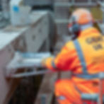 Diamond Core Drilling: Creating holes to facilitate chains, for removal of isolated Reinforced Concrete Walkways