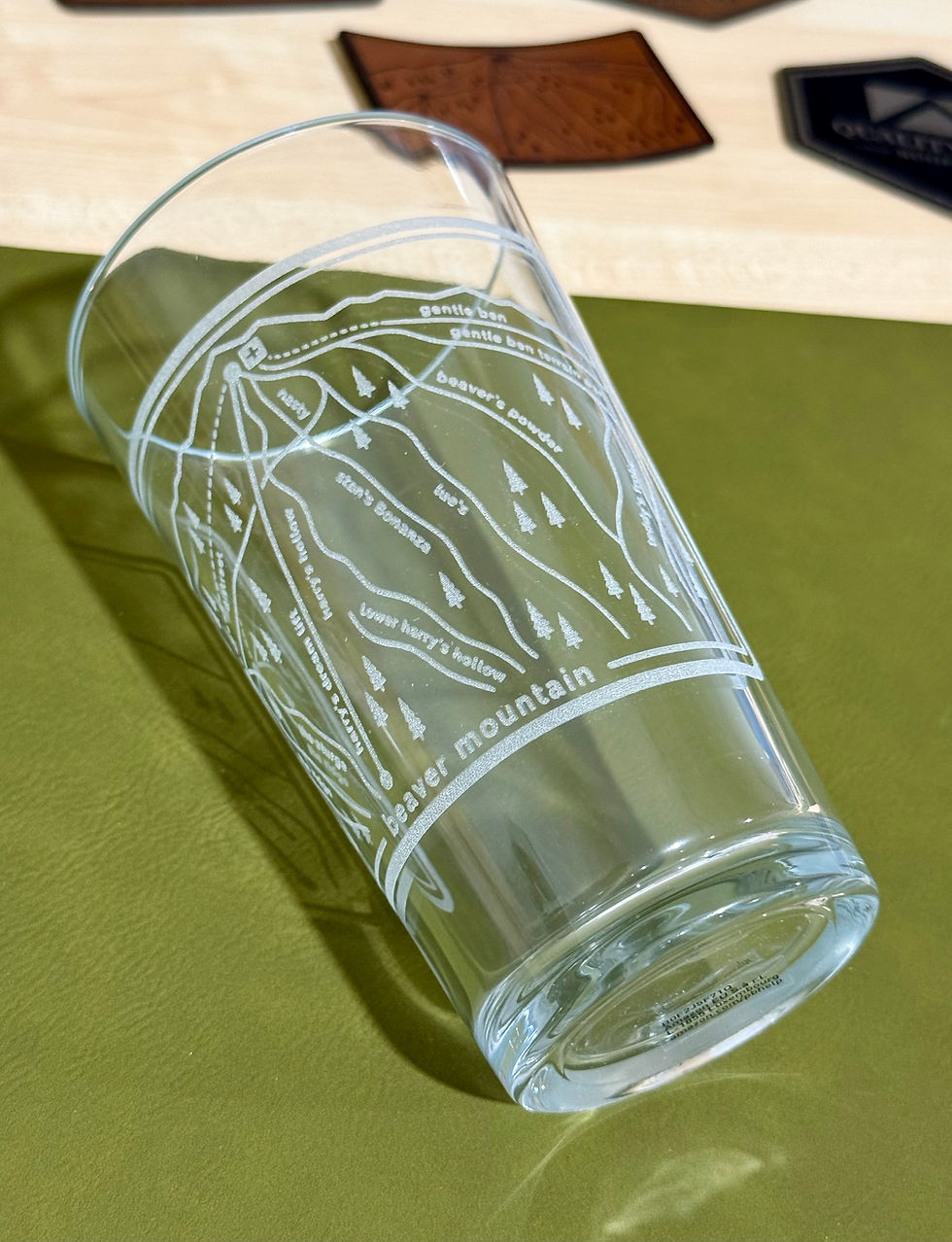Custom engraved pint glass with business logo