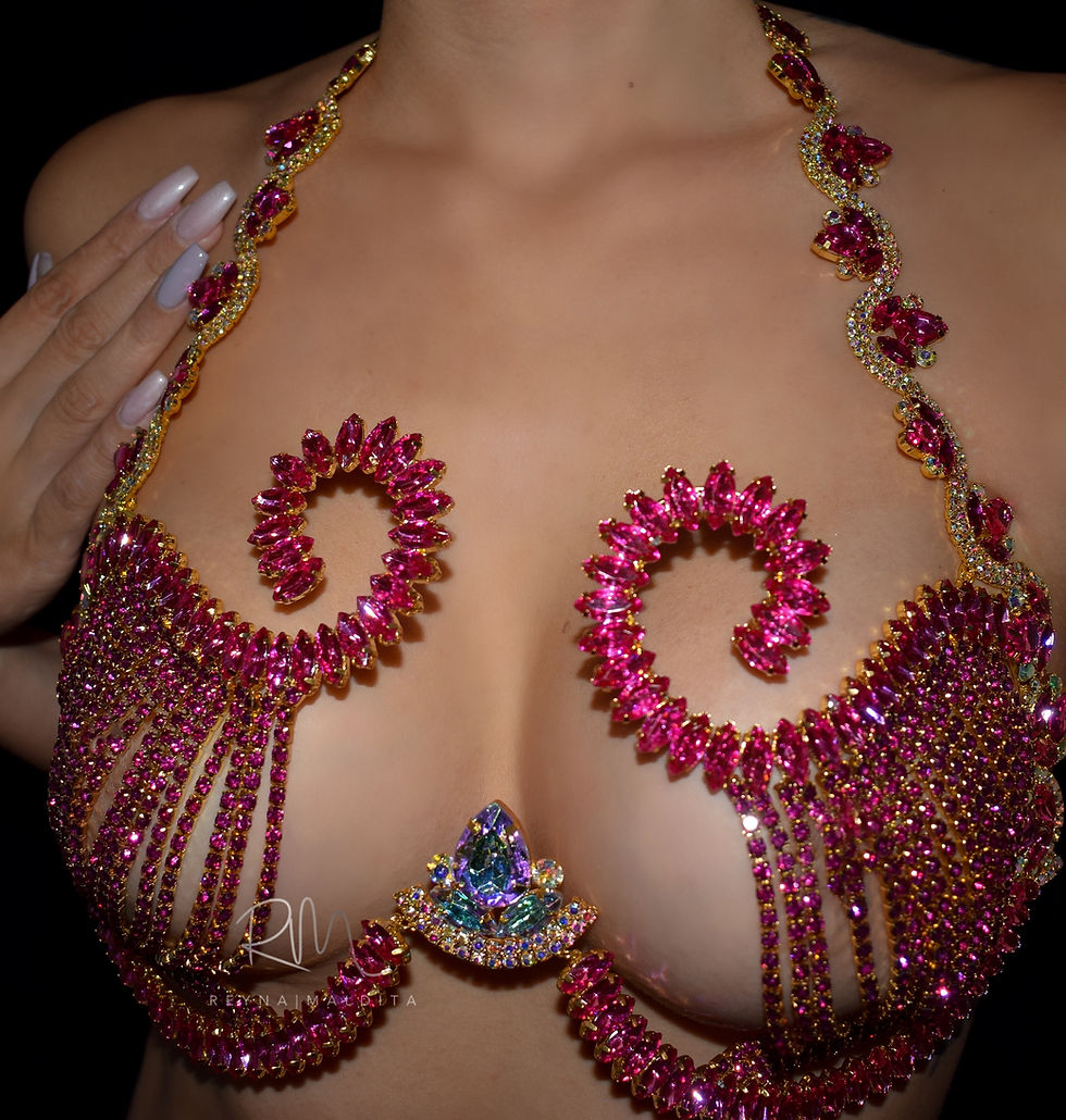 Thumbnail: Tilted view of the magenta crystal bra by Reynamaldita in pink crystals