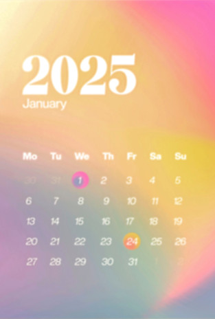 A desktop calendar with a blurry backgro