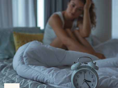Anxious woman struggling to sleep