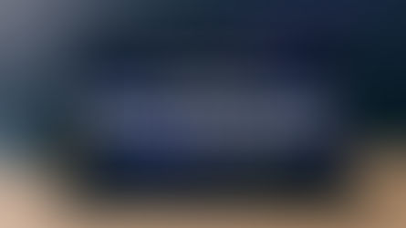 Laptop screen showing futuristic AI-powered Comet browser with sidebar assistant and comet streak graphic, NFSTUBE