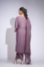 Model wearing smoked purple cotton kurta set with bell sleeves, pleated salwar, and organza dupatta with zari checks