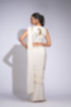 Off-white pre-stitched drape saree with embroidered gold toucan blouse | SHRUTI S – for cocktails & modern Indian events