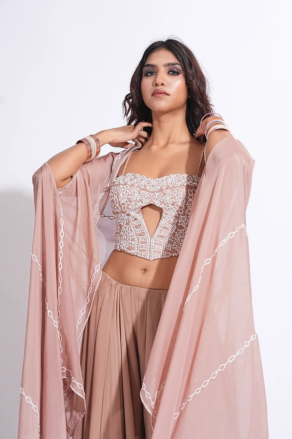 Thumbnail: Nude-Pink Corset with georgette sharara and cape in white Sequins
