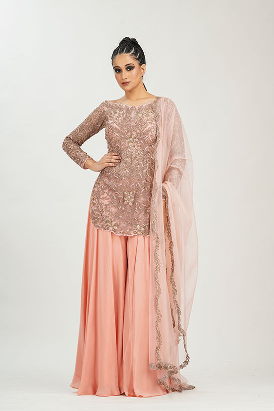 Peach sharara set with boat neck and floral embroidery by SHRUTI S