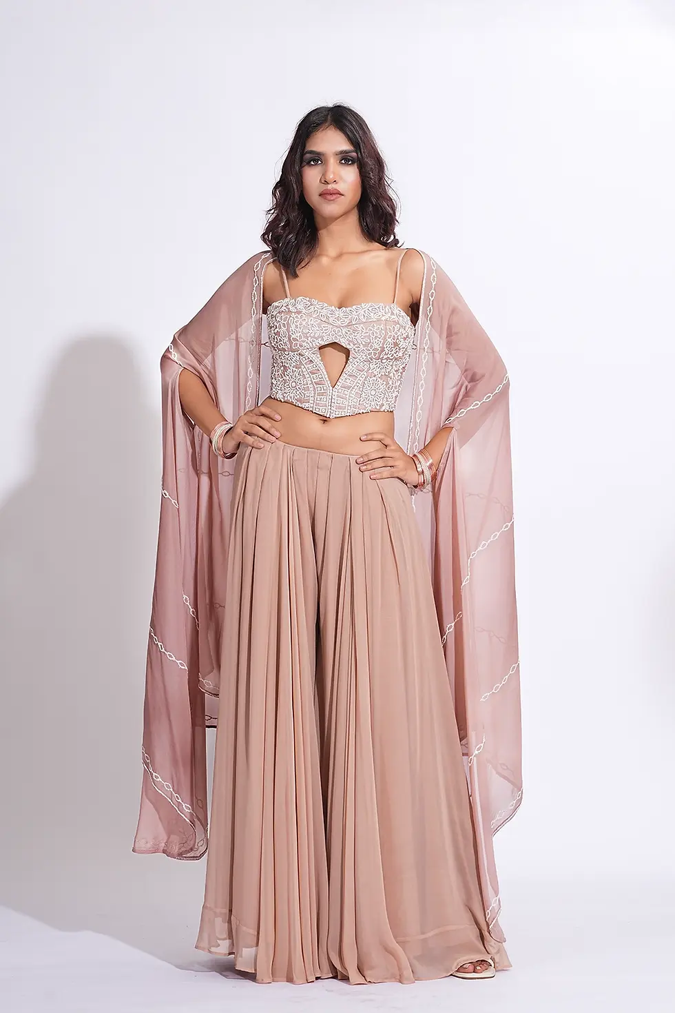 Thumbnail: Nude-Pink Corset with georgette sharara and cape in white Sequins