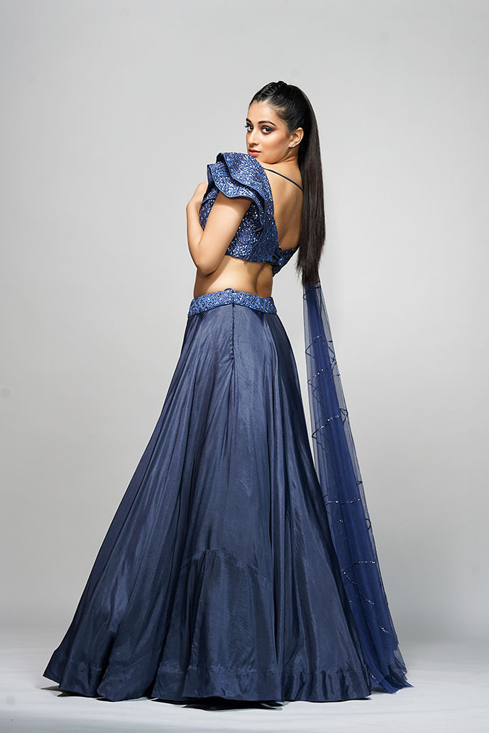 Thumbnail: Sustainable lehenga with subtle shimmer and couture finish styled for reception, cocktail, or engagement party