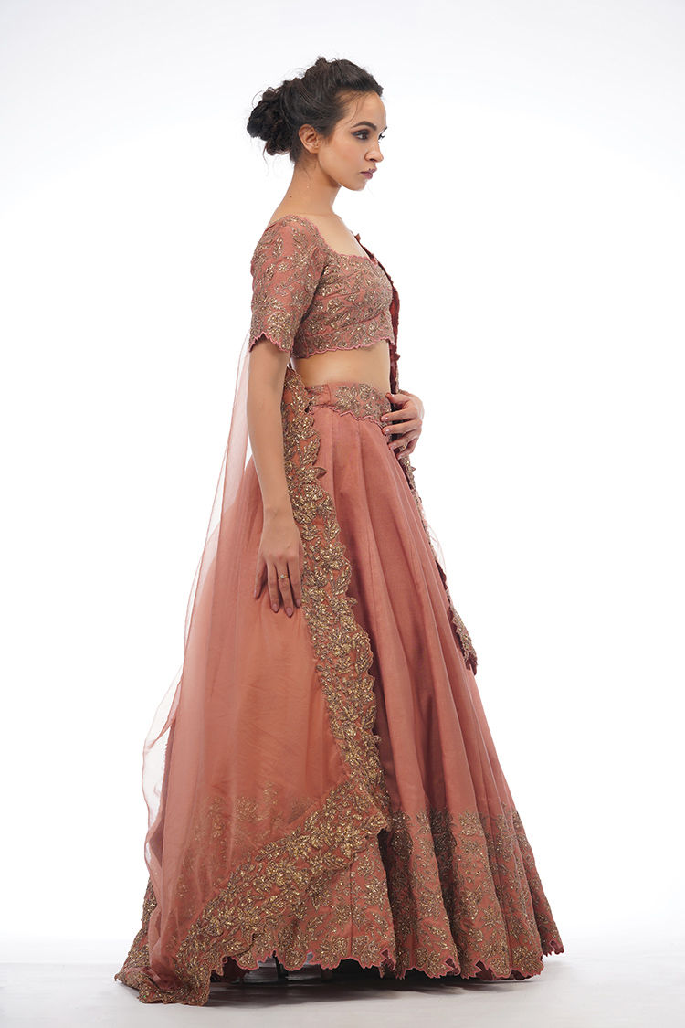Thumbnail: Indian bridal couture lehenga in light cinnamon with sustainable upcycled embellishments