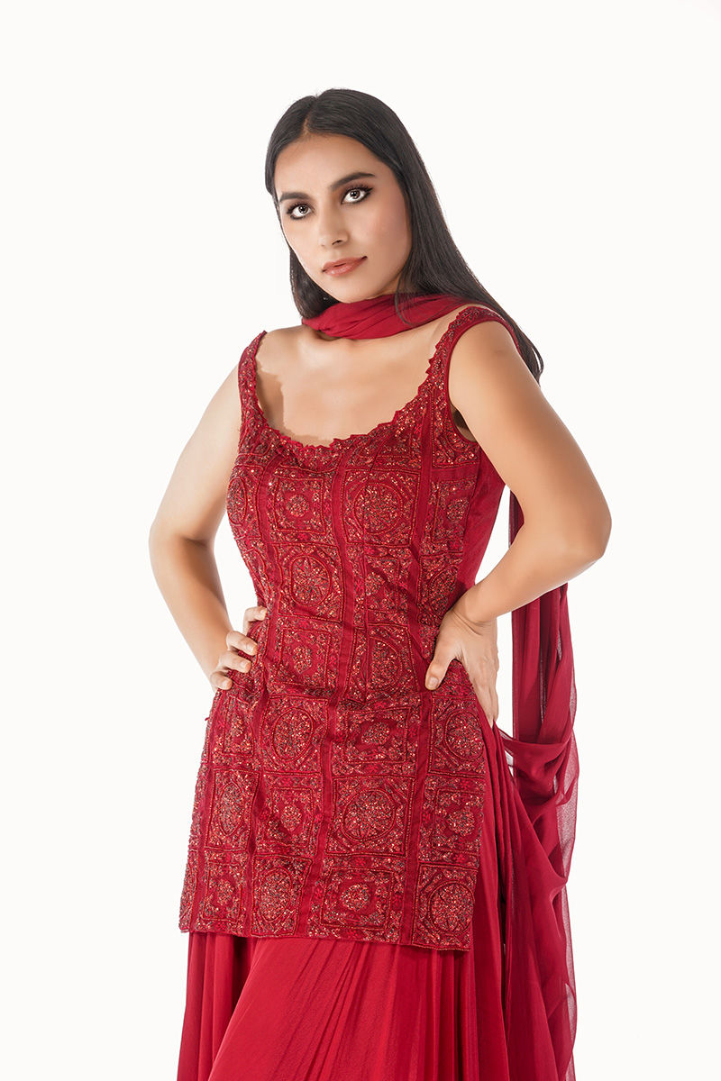 Thumbnail: Designer red net kurta with scalloped edges and pearl detailing