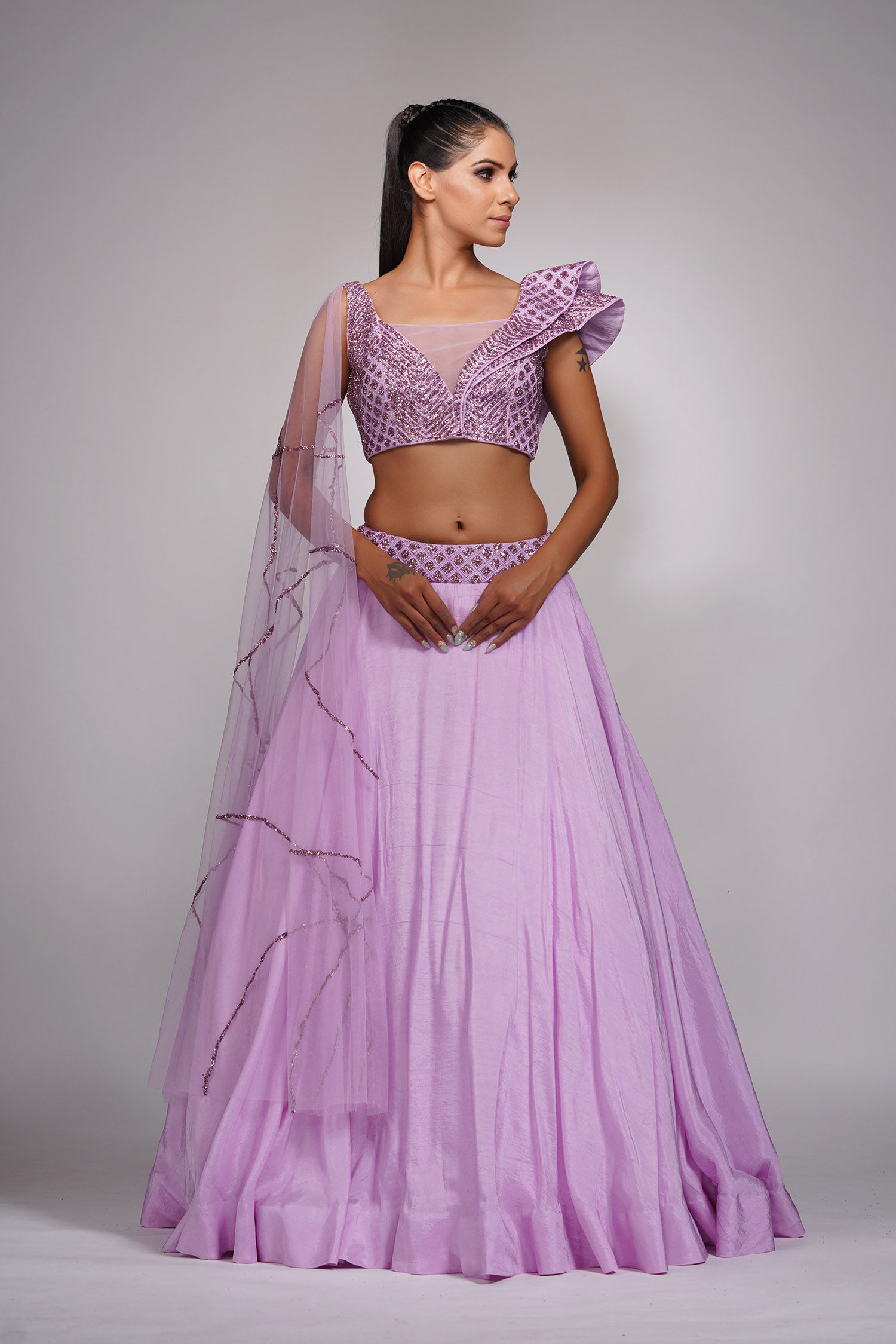 Lavender lehenga gown with thread and upcycled sequin embroidery by SHRUTI S