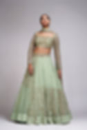 Designer lehenga set in soft sage green star net with scalloped dupatta