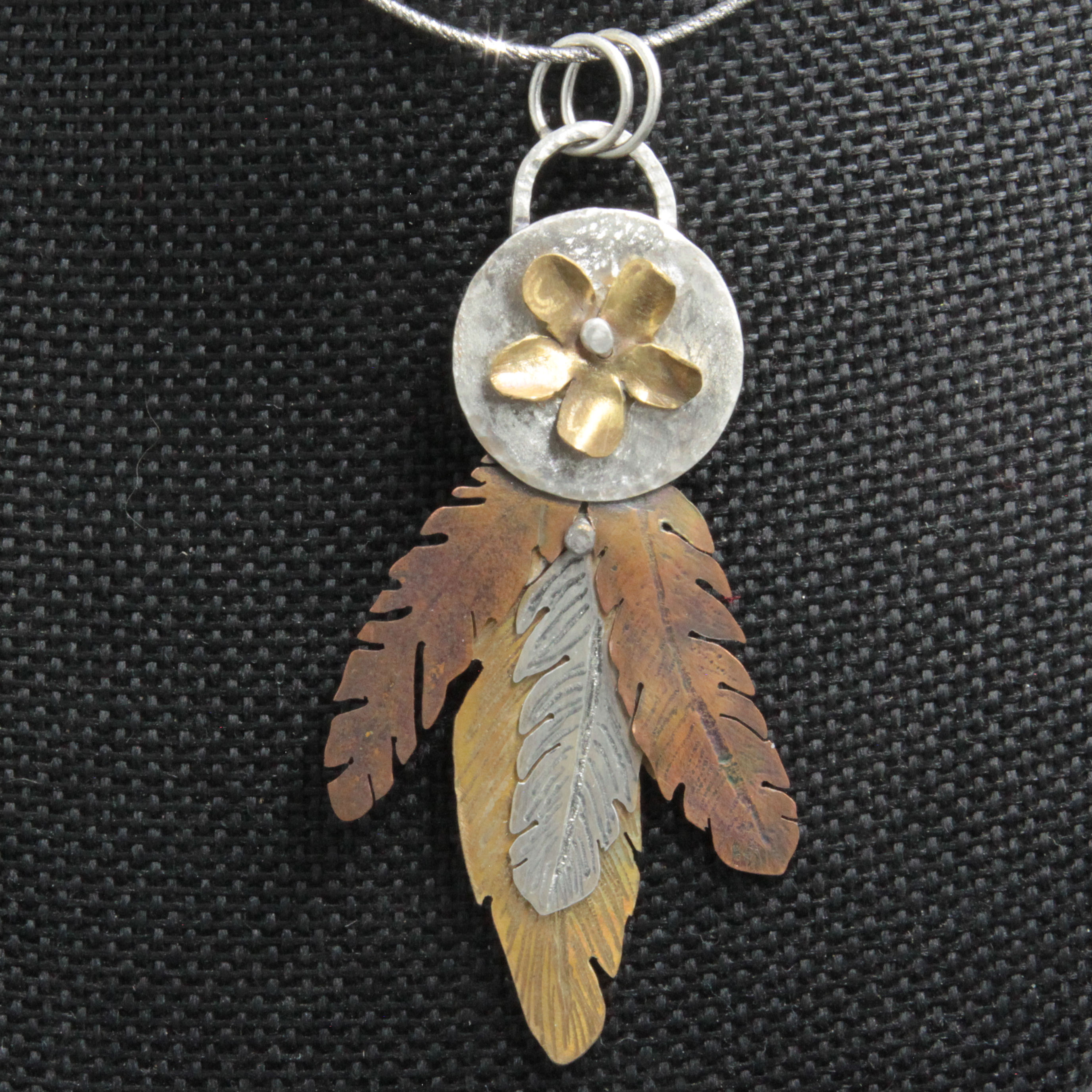 4 feather pendant